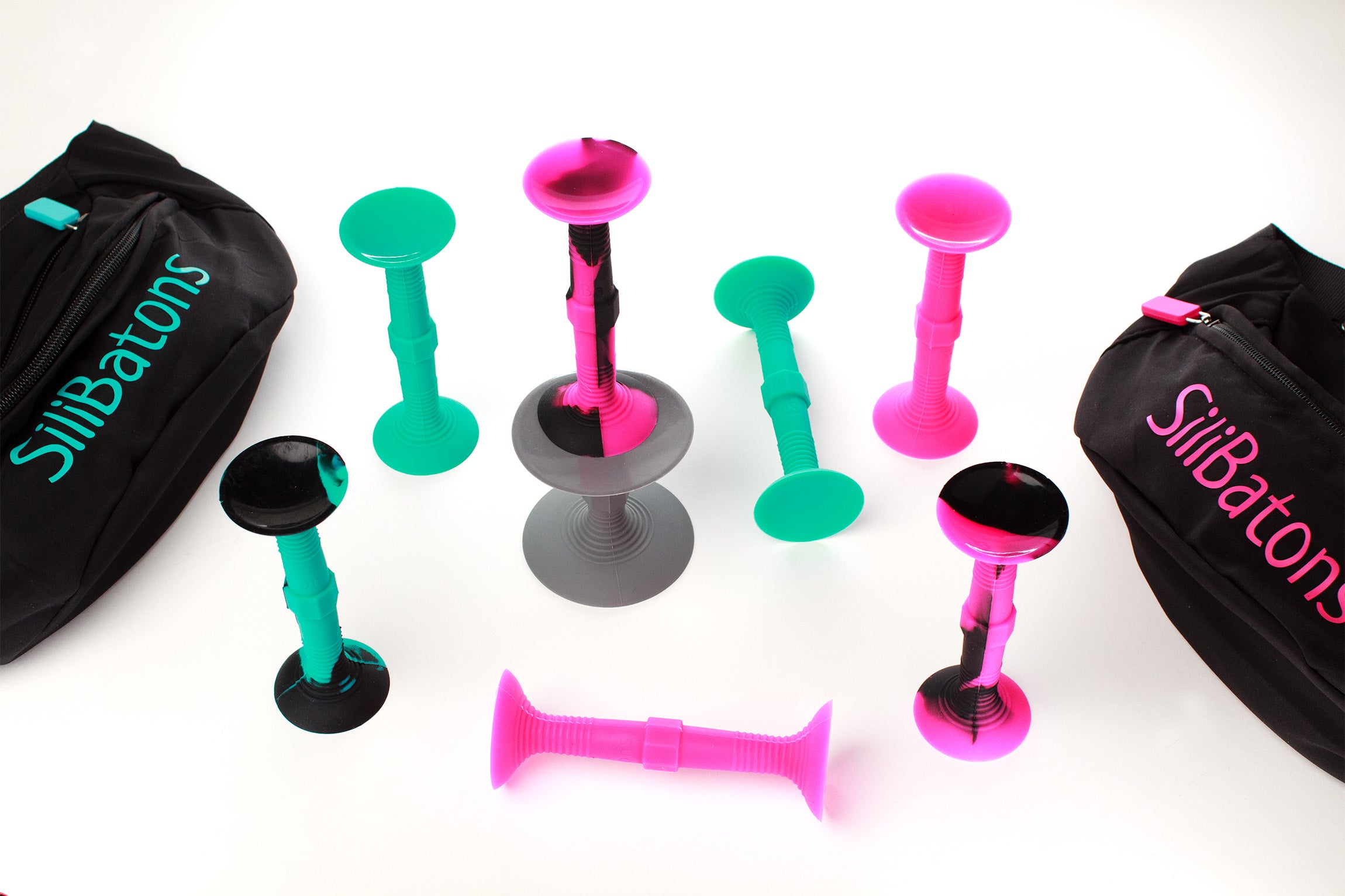 Teal and Pink SiliBatons 2-Pack Set with Black and Swirl Variants, Ideal for Suction Cup Dart Games